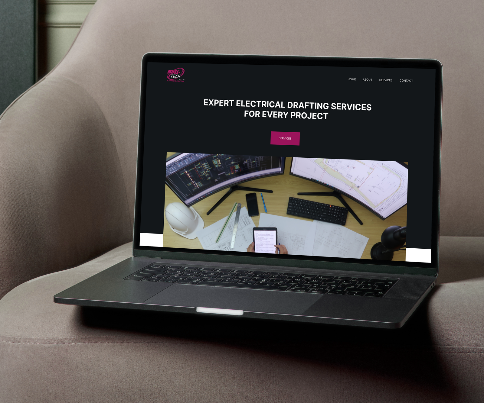 muse-tech website on laptop sitting on couch